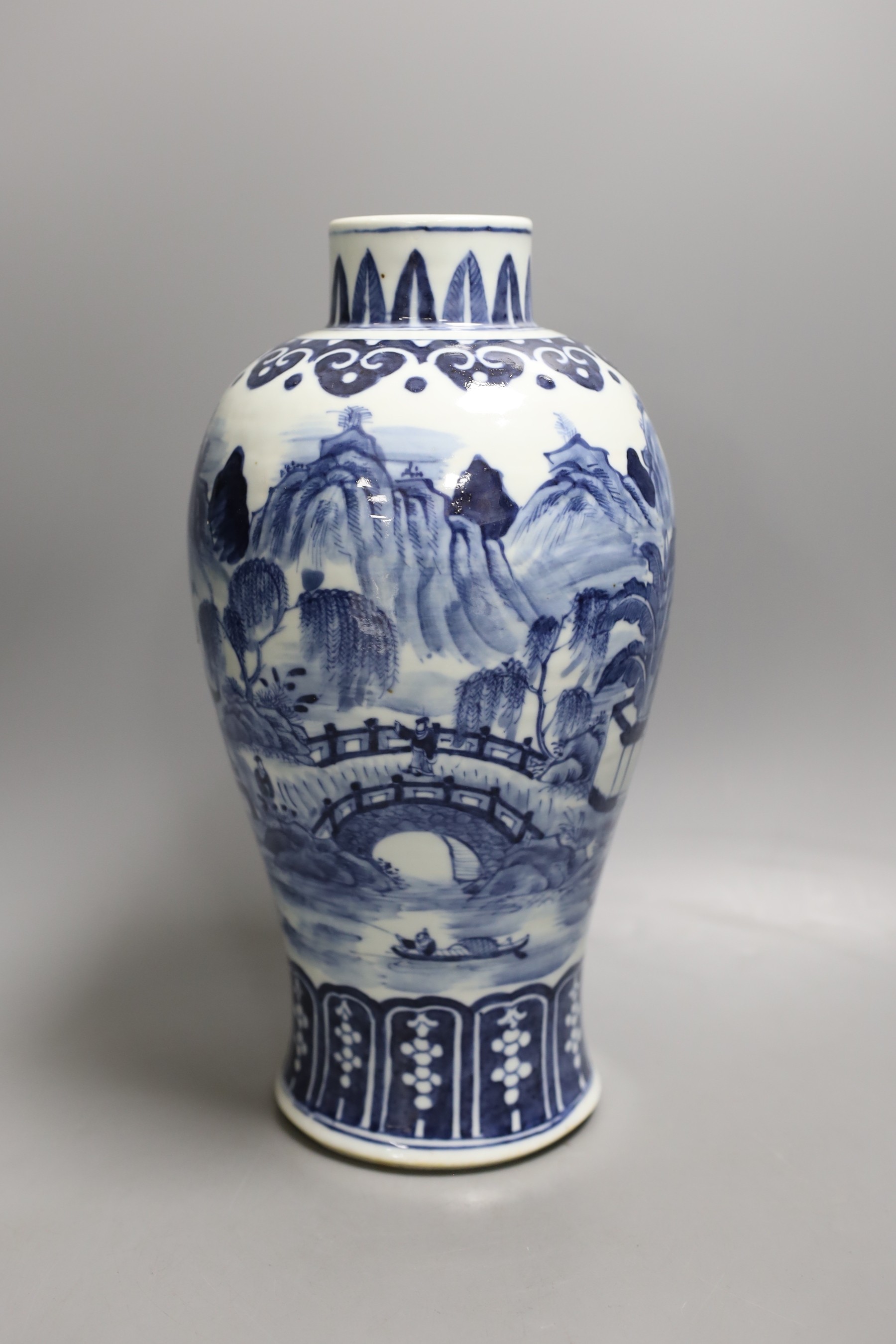 A 19th century Chinese blue and white landscape vase 29cm